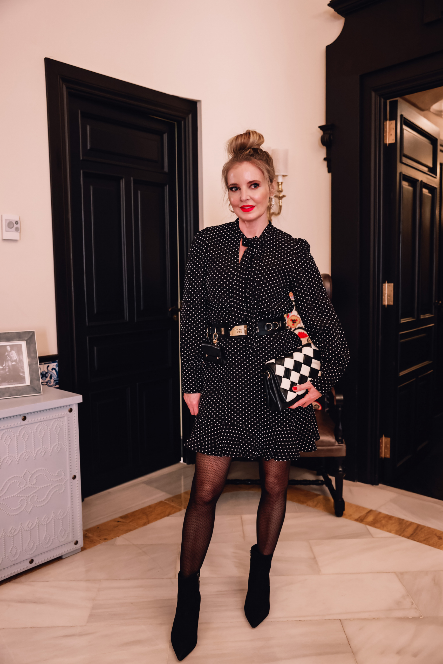 leggings versus tights, how to wear leggings, how to wear tights, difference between leggings and tights, erin busbee, patterned tights, polka dot dress, schutz bette boots, black and white check mango bag, Hotel Alfonso XIII