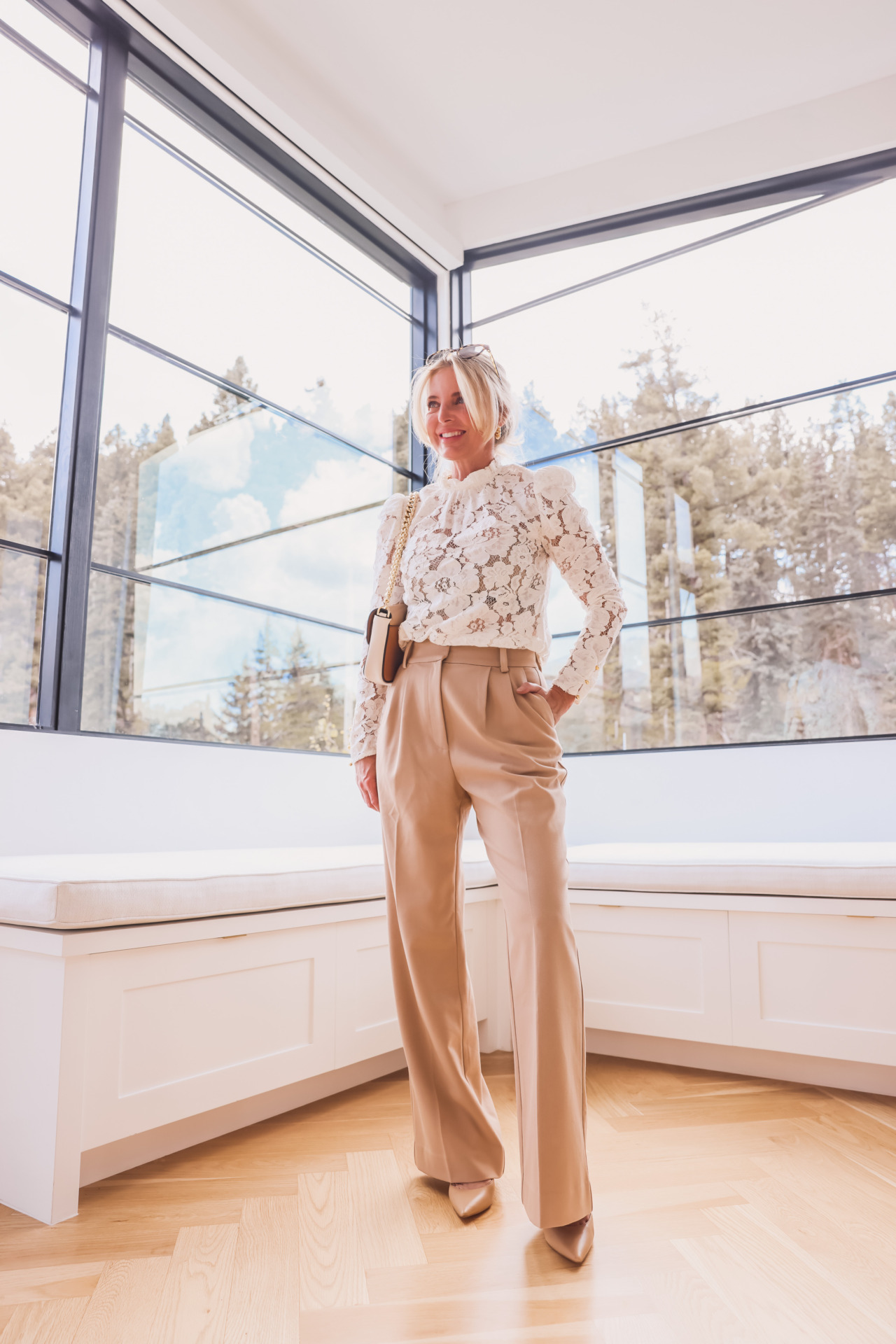tan pants styled with lace top